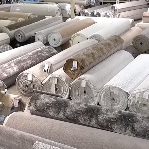 rolls of carpet in warehouse | New York Carpets & Flooring | Orange County, CA