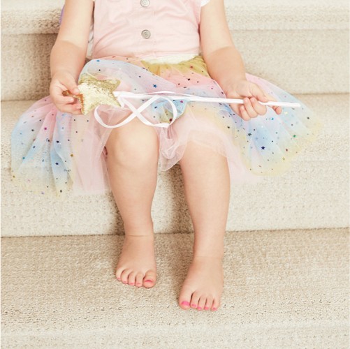 Cute baby sitting on stairs | New York Carpets & Flooring